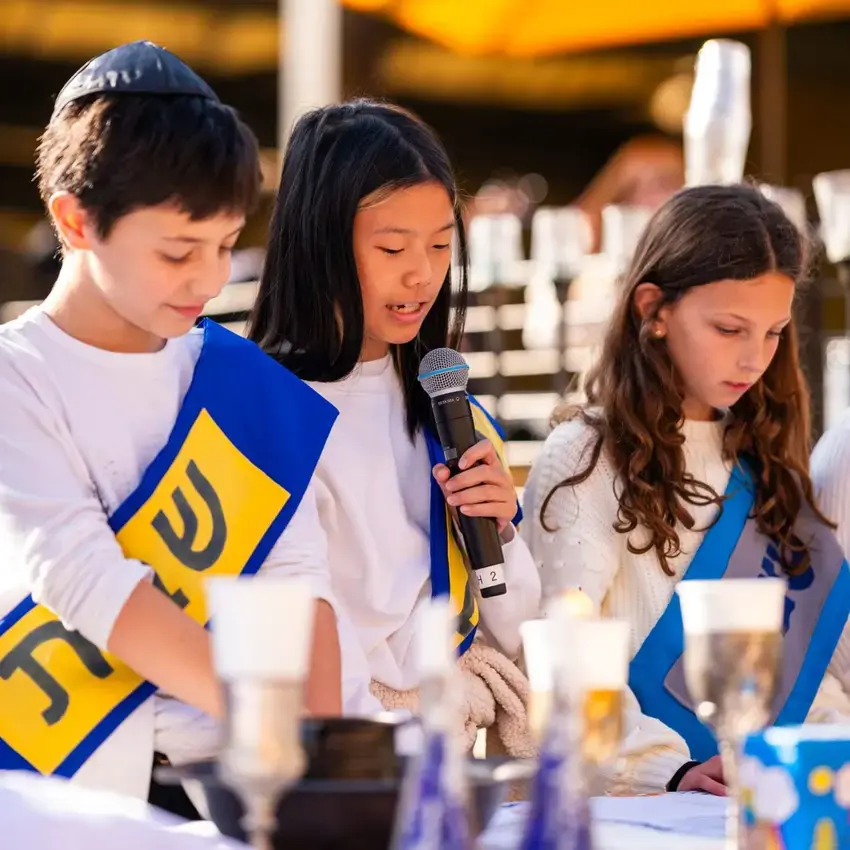 Students taking part in Jewish tradition