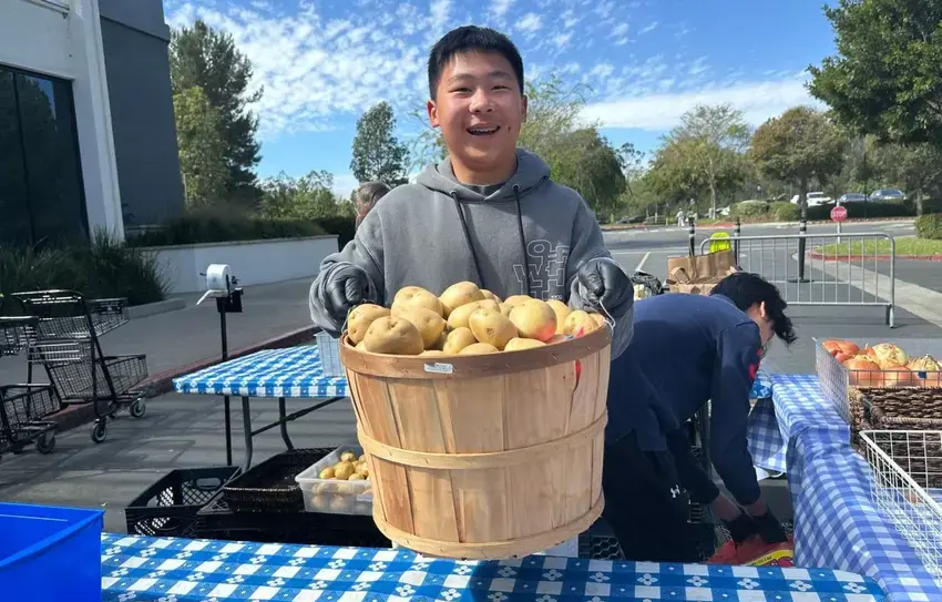 A boy with food basket