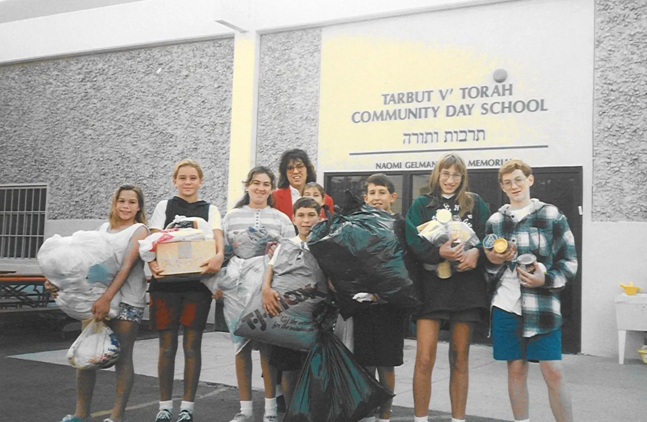 Students standing outside school building