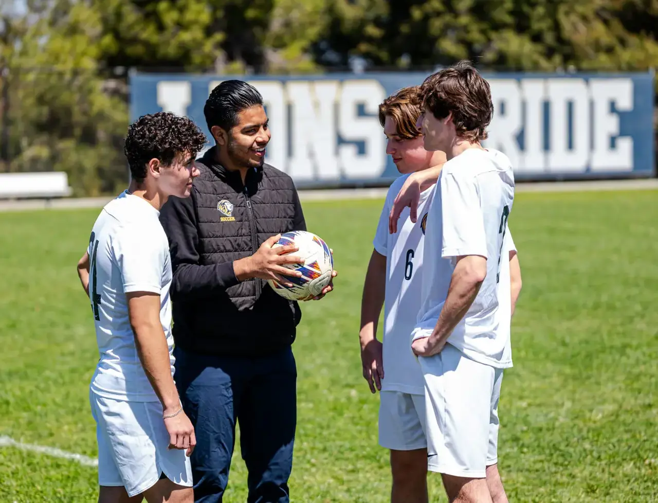 picture of coach with team