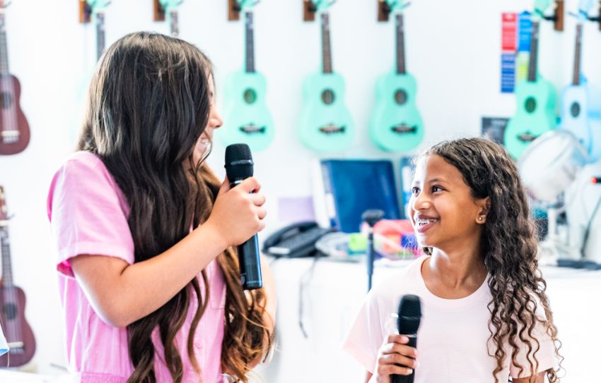 photo of student leadership-presenting to a class, walking in the fashion show, performing at sporting event