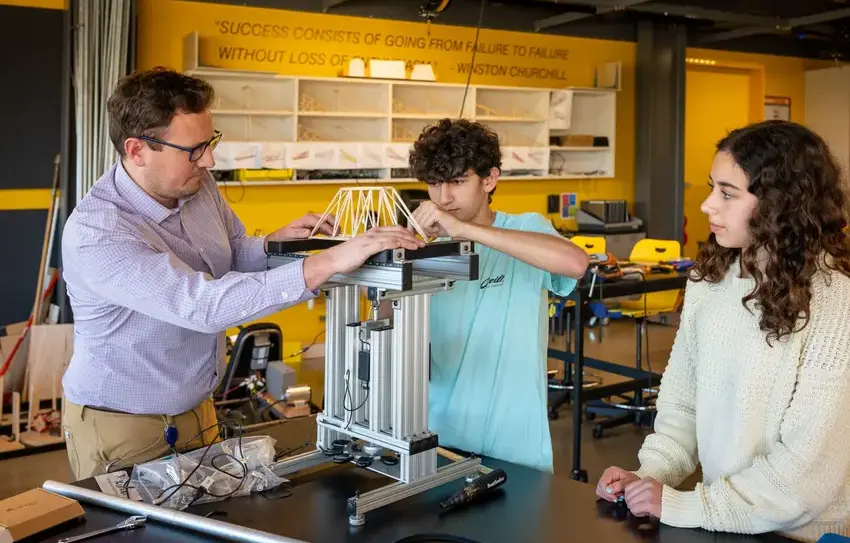 students and teacher in lab