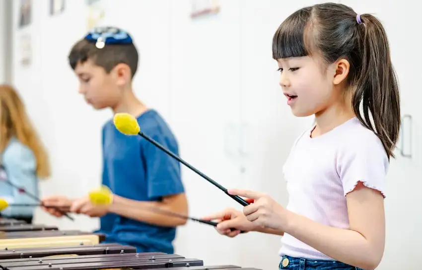 photography of Lower School playing instruments