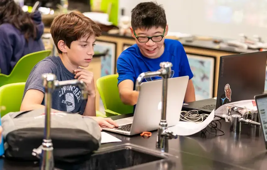 photography of Middle School students in the makerspace