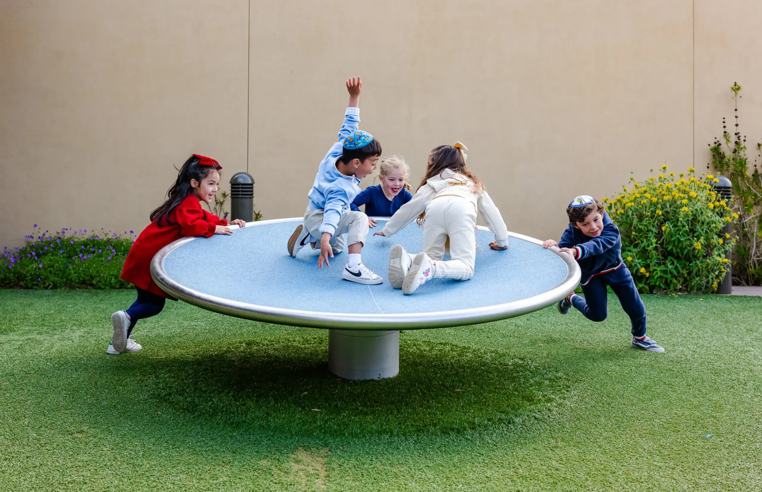 Students playing on playground equipment