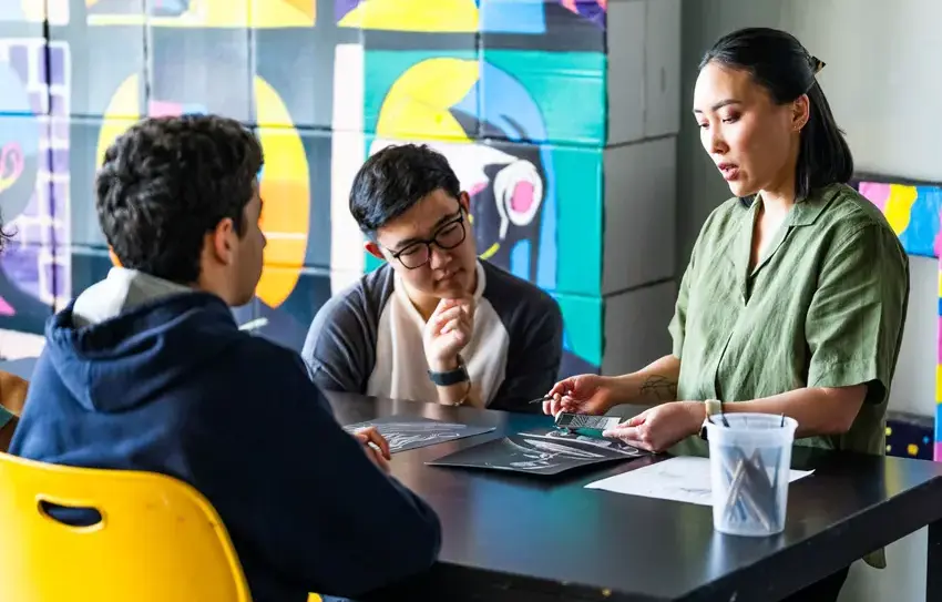photography of Upper School students collaborating on an art projec