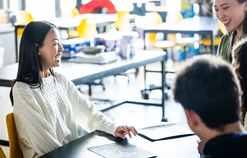 photo of students having fun or reflecting togethe