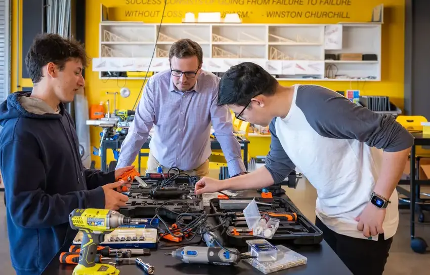photography of Upper School students collaborating on an engineering/computer science project