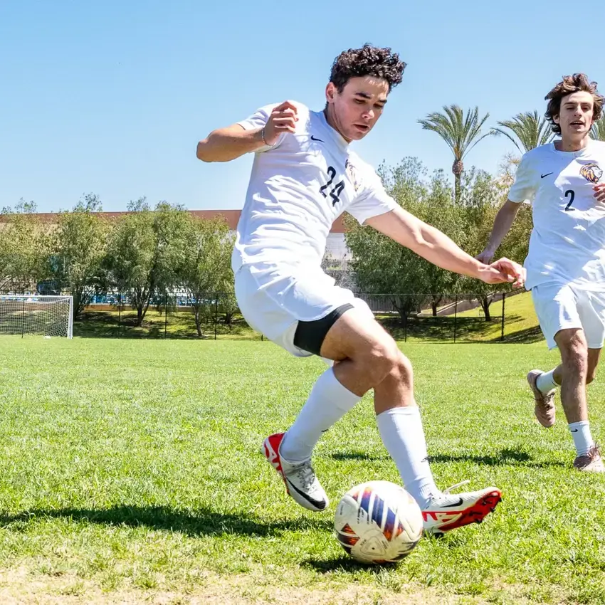 Student athletics playing soccer