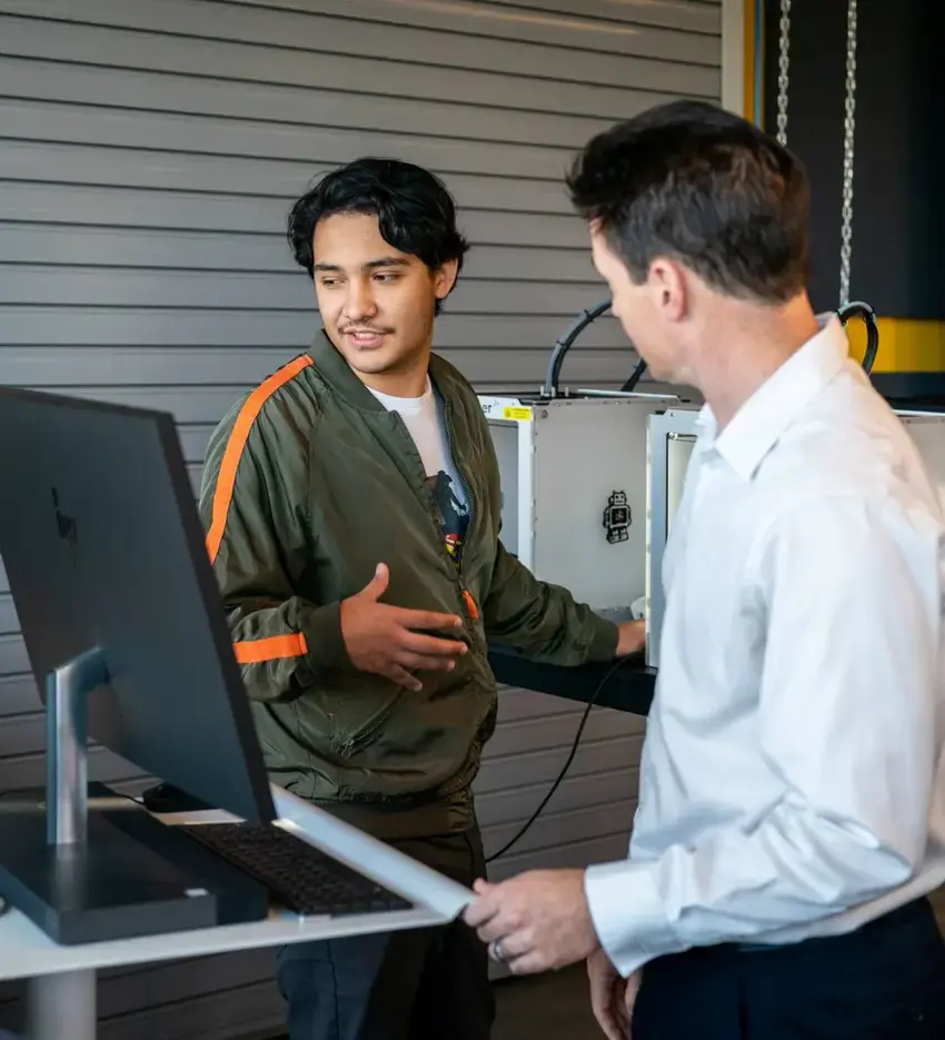 Upper school student with teacher